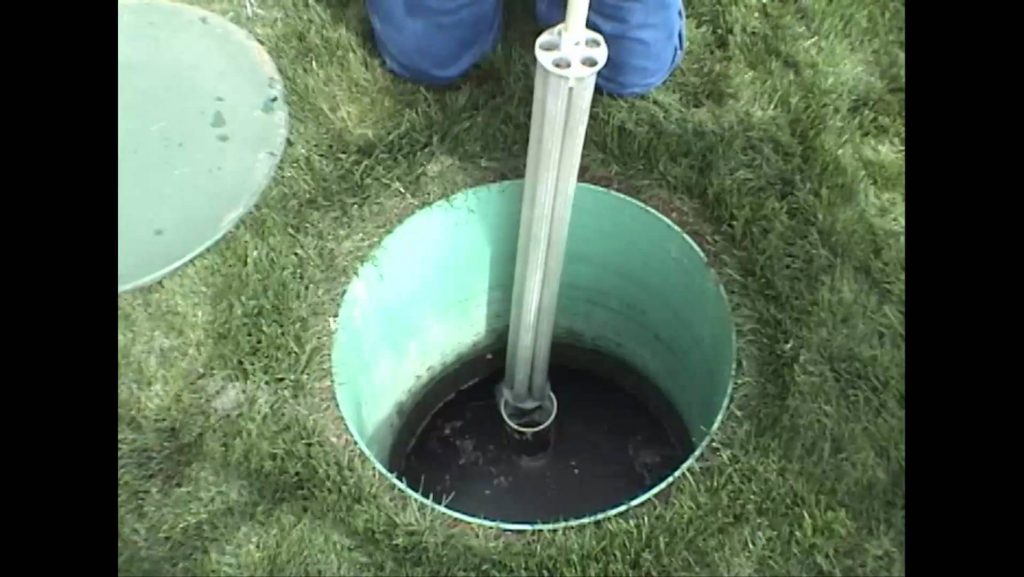 Image of a septic tank being maintained and cared for.