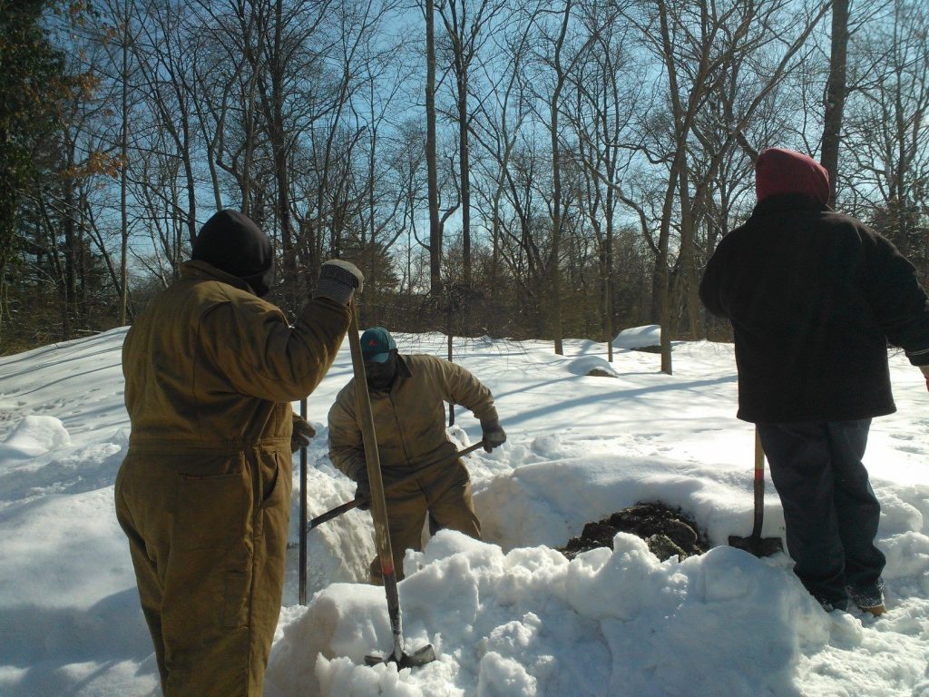 Image of septic system maintenance during winter.