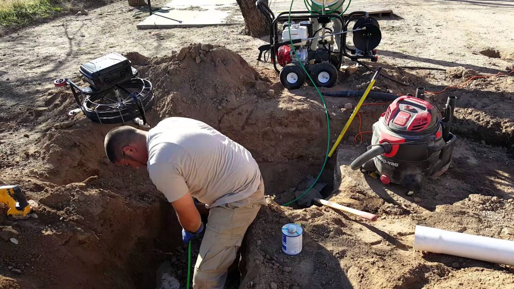 Image of a drain field being repaired.