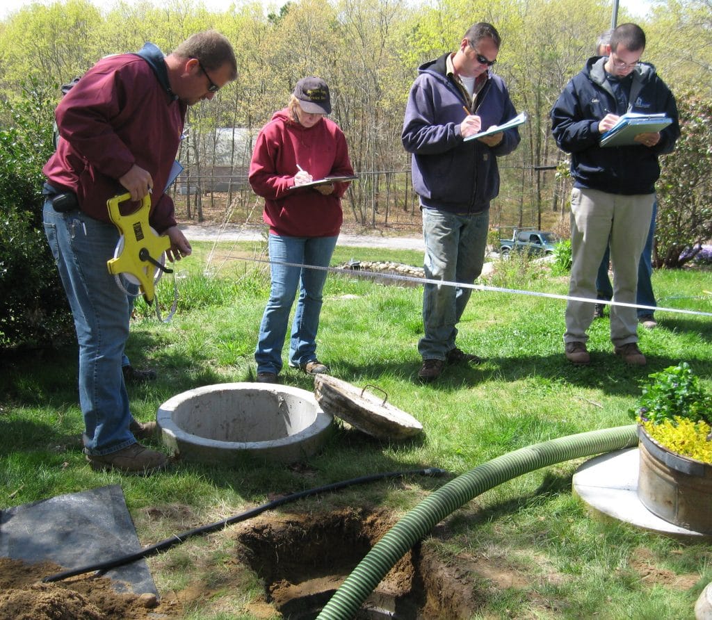 Image of ongoing septic tank maintenance.