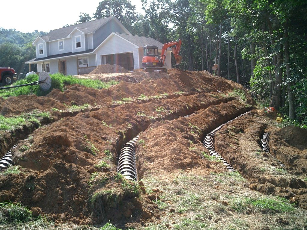 Image of a drain field being installed.