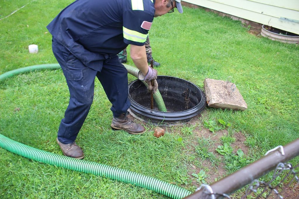 Image of sand mound septic cleaning.
