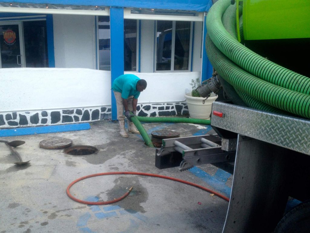Image of an apartment complex building grease trap control.