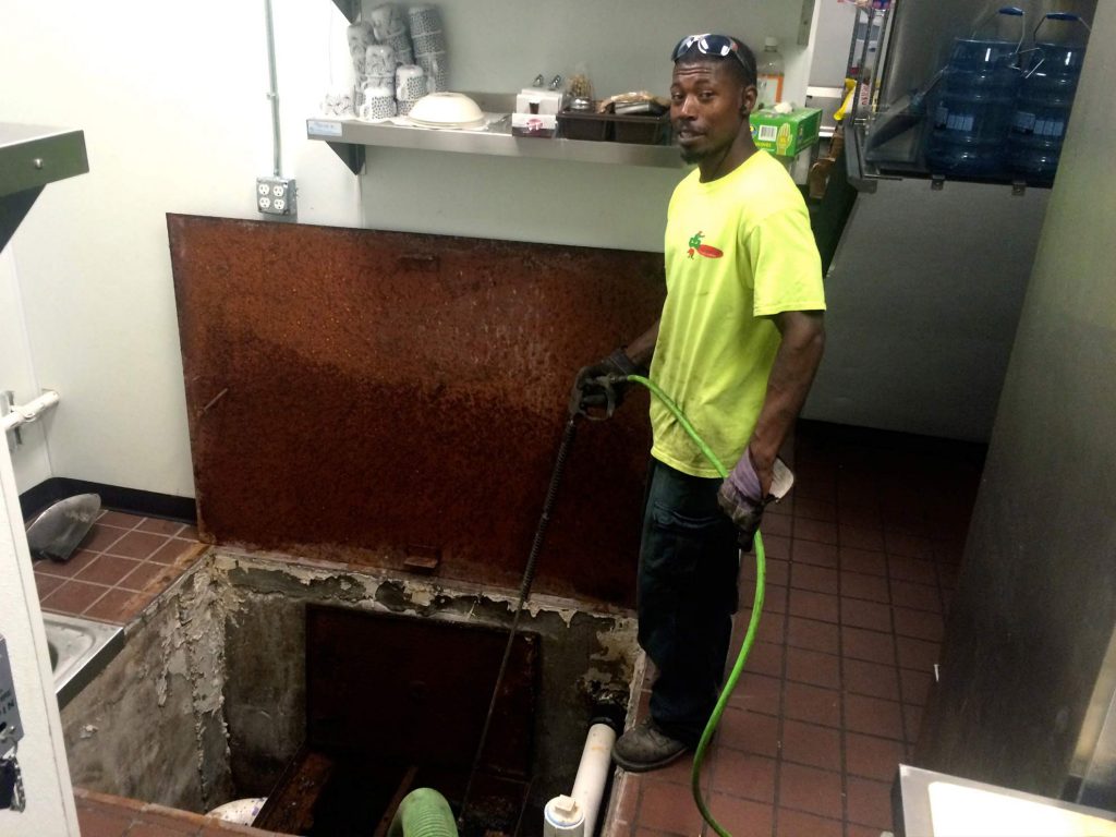 Image of government housing grease trap elimination.