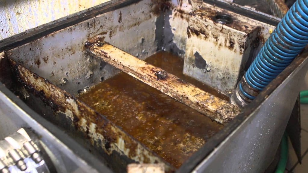 Image of commercial grease trap problems.