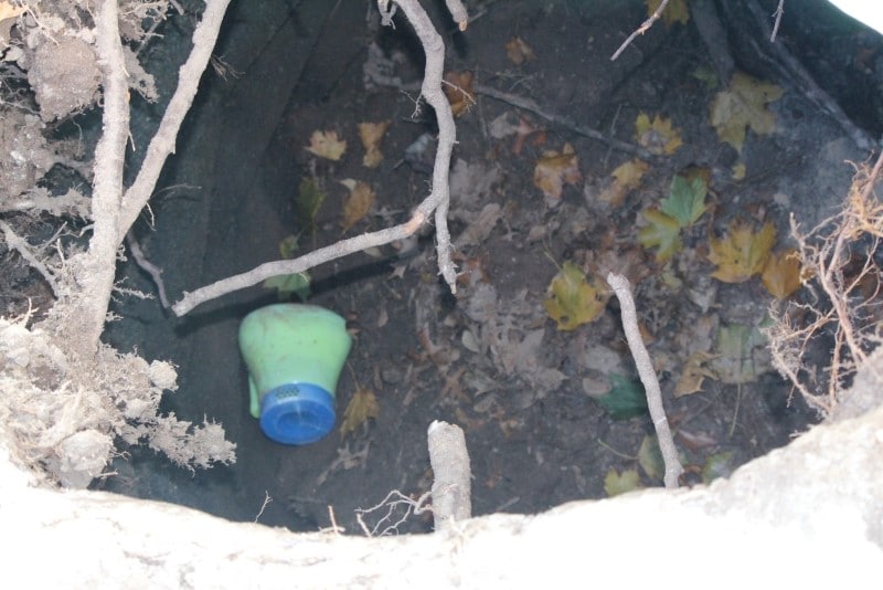 Image of a cesspool in need of natural cesspool cleaners.
