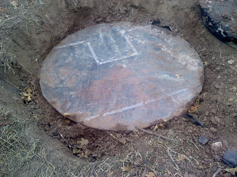 Image of a septic lid.