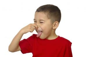 Image of a student smelling foul grease trap odors.