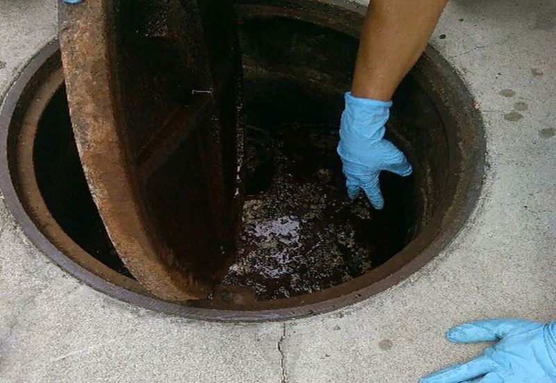 Image of office complex grease trap maintenance.