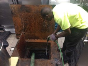 Image of government housing grease trap elimination.