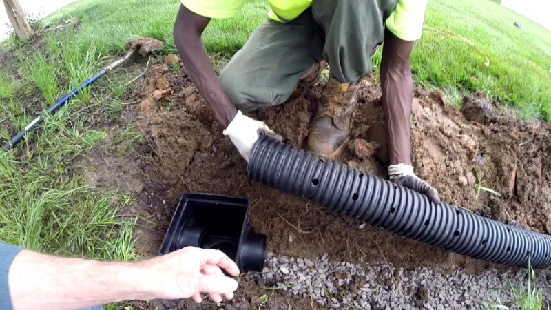 Image of a french drain being installed to help the cesspit.