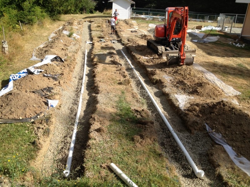 Image of a drainfield undergoing drain field preventive maintenance.