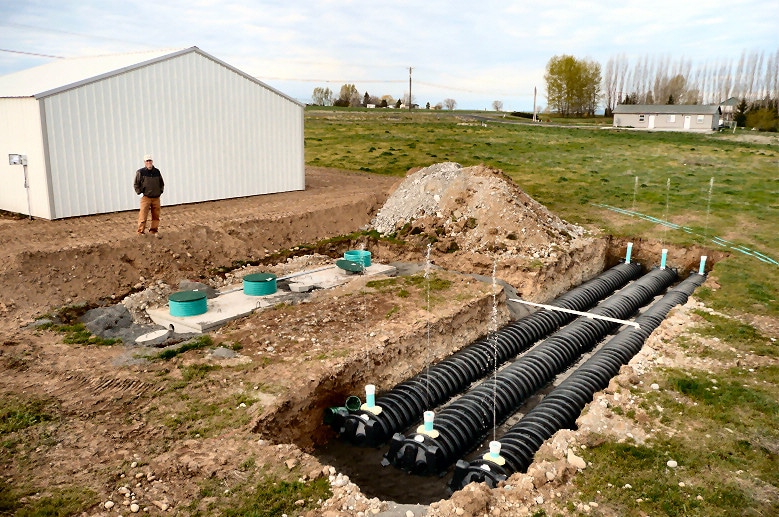 Image of a septic tank drainfield being installed.